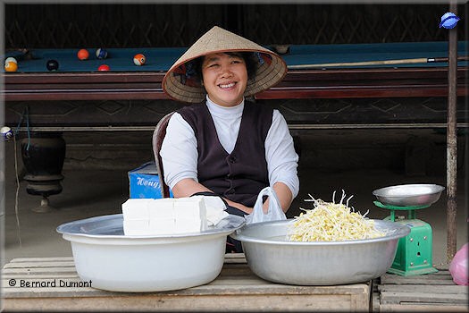 Woman selling tofu and soy sprouts